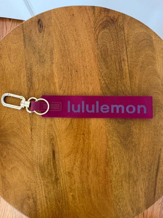 lululemon athletica Accessories - Lululemon Never Lost Keychain Wristlet in Magenta Pink with Gold Hardware